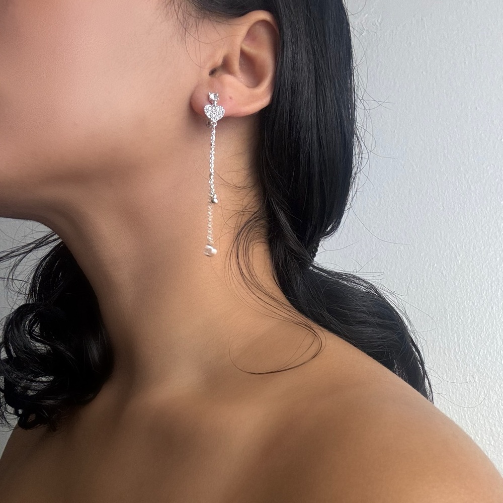 Silver heart dangle earrings